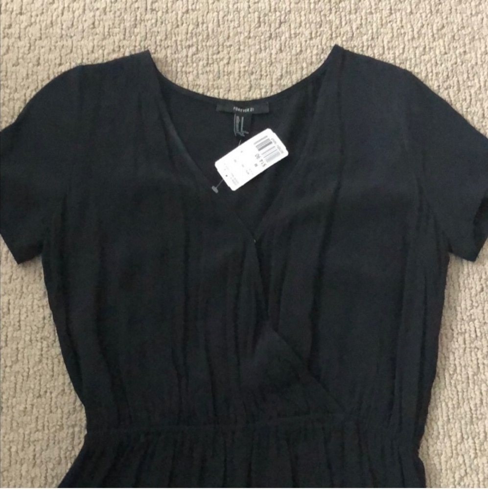 Back shirtw sleeved shorts jumpsuit.